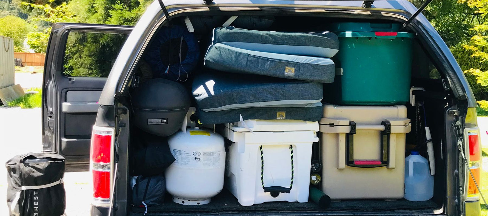 car packed for a camping trip with HEST Dually in the trunk