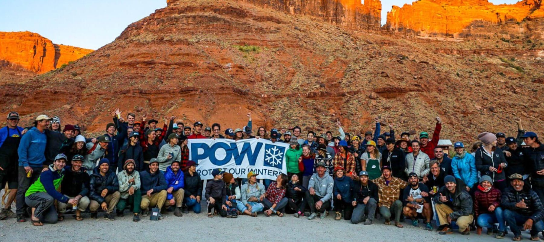 Members of Protect Our Winters in Moab posing