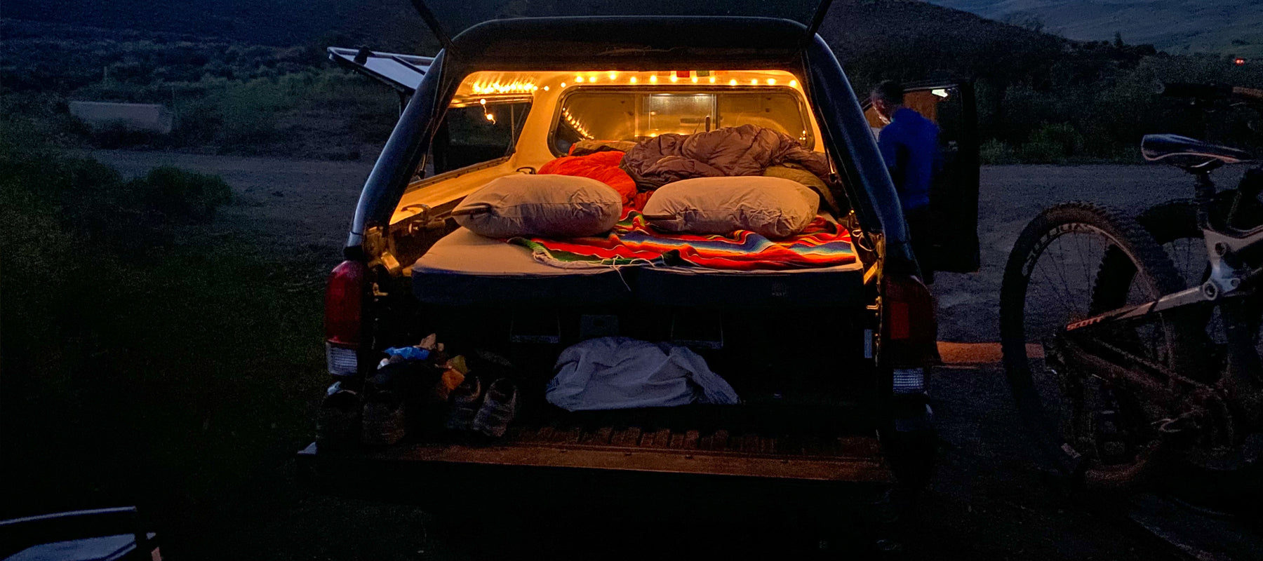 Toyota Tacoma truck bed with a HEST mattress inside. Best for car camping truck conversion.