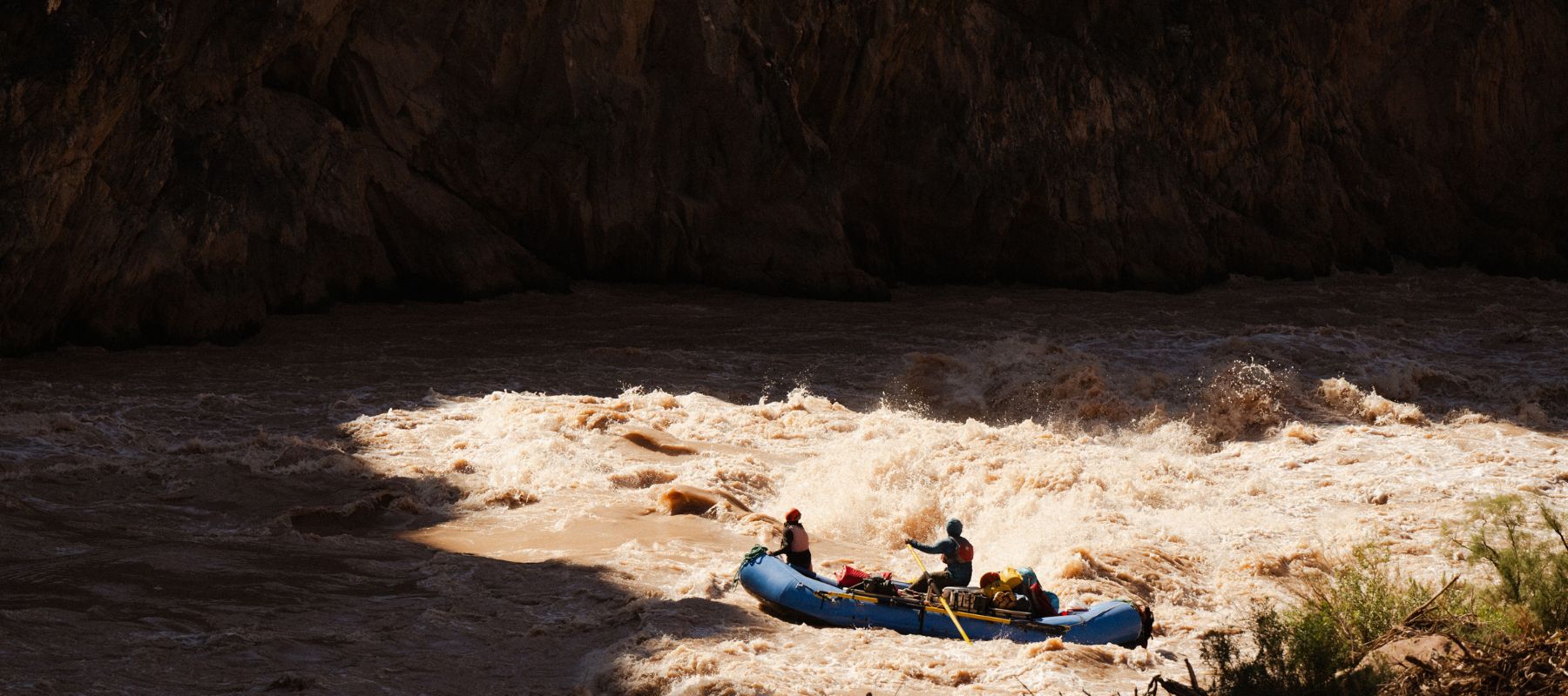 people rafting down the Colorado River in the Grand Canyon